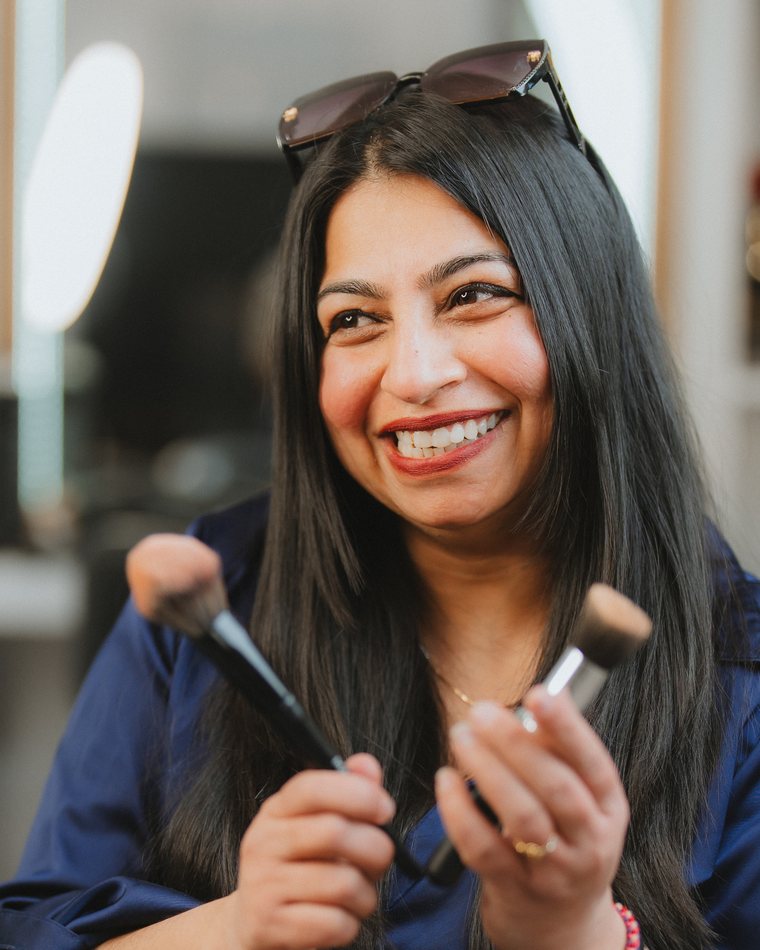 Pia holding makeup brushes at Beauty with Grace, St Albans, Christchurch